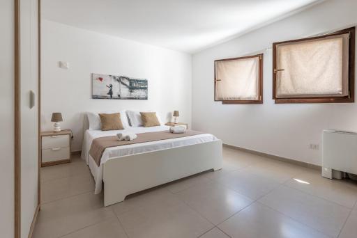 Malù Holiday Apartment-Palazzo Quaroni - Housity