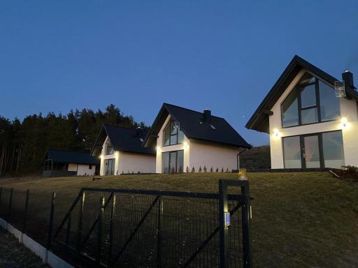 Domki U Zbyszka nad jeziorem z balią ogrodową! - Housity
