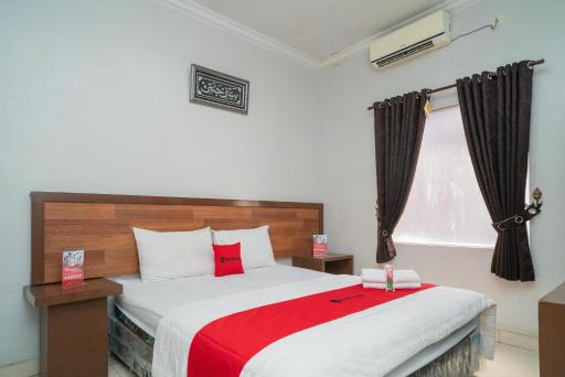 RedDoorz Syariah Near Tugu Dodol Kandangan - Housity