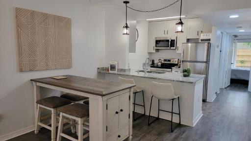 Discover Luxury Condo Steps Away from Celebration Pointe and I-75! - Housity