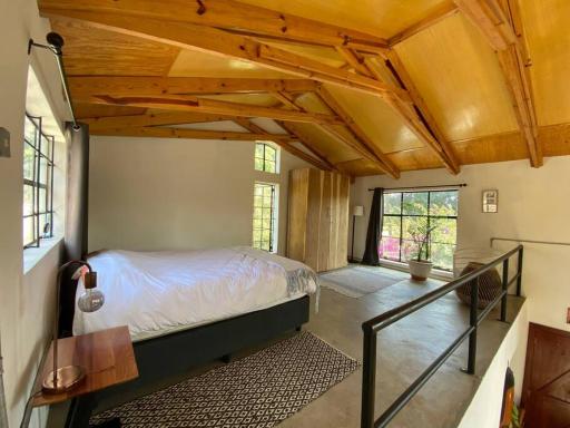 Modern Loft House with Exposed Timber Trusses - Housity