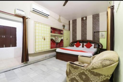 Hotel Madhva Naimisharanya By WB Inn - Housity