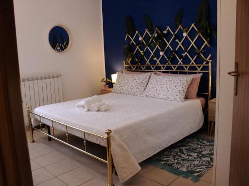 La Ringhiera Tropicale-bilocale con parcheggio e self check in - Housity