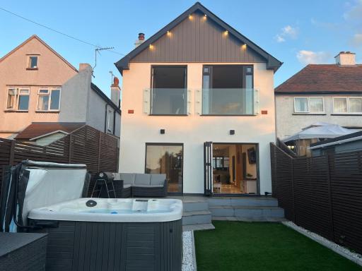 Broadway Beach Homes AirBnb with Hot tub - Housity