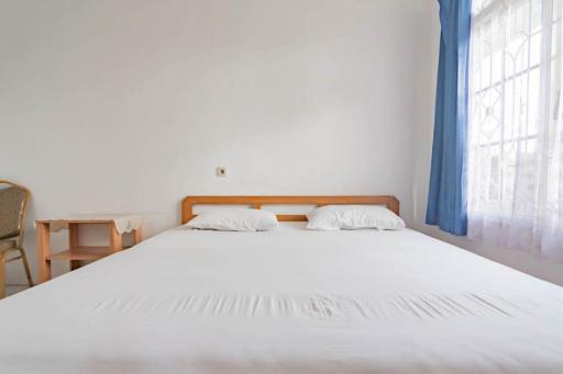 Pall Inn Puncak Mitra RedDoorz - Housity