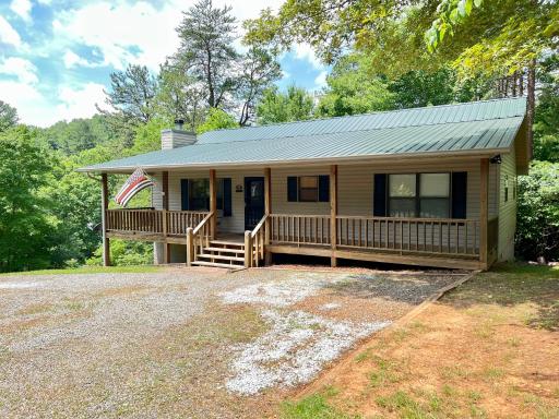 One-Story Pinewood Cabin King Bed in Young Harris - Housity
