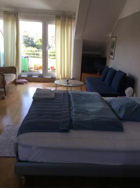 Dachstudio mit Bad und Terasse - Housity