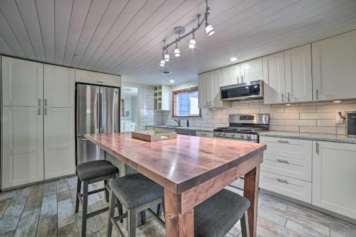 Prudenville Retreat with Yard about 1 Mi to Lake! - Housity