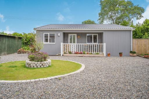 Caldey Lodge Bier Wood Lodges - Housity