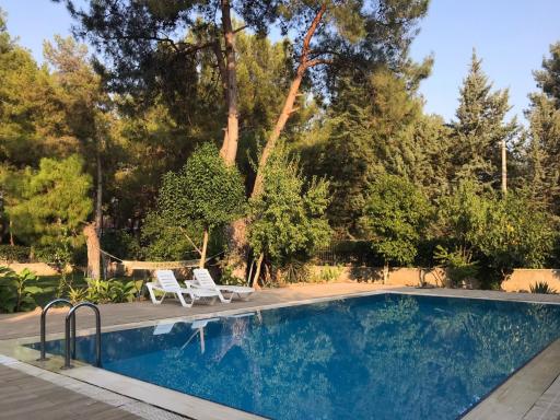 Lovely Summer House with Shared Pool in Kepez - Housity