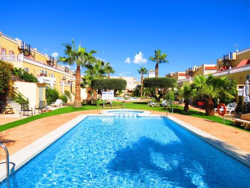 Casa La Zenia Elite Townhouse with Shared Pool and 10 Minutes Walk to Beach - Housity