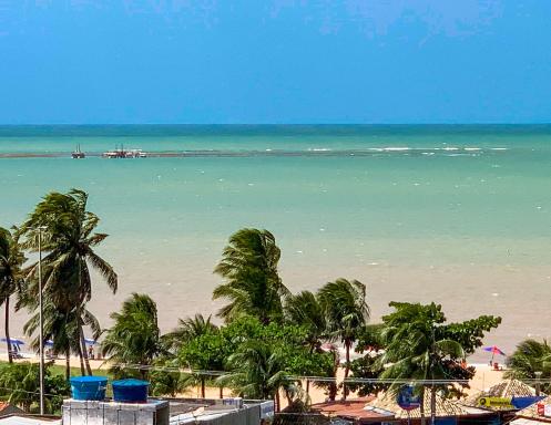 Apto com vista da praia mais bonita da cidade! - Housity