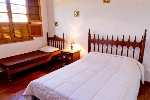 CASINHAS DA LAPINHA- Lapinha da Serra - Casa Verde 2 suites com deck - LATE CHECK OUT- Piscina compartilhada - Housity