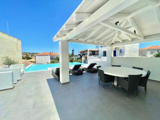 Portoheli Villa Downtown, Pool & Port view - Housity