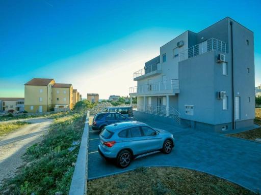 Apartments with a parking space Novalja, Pag - 17954 - Housity