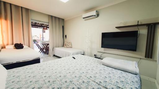 Confortável casa em Arembepe,100 metros da Praia com Churrasqueira Piscina e Wi-fi - Housity