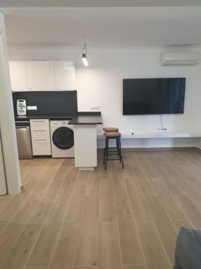 Newly Renovated Varkiza Beachside One Bedroom with Large Terrace - Housity