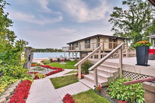 Riverfront Algonac Home with Shared Backyard! - Housity