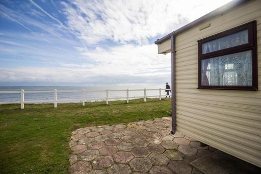 6 berth caravan with full sea views at Hopton Holiday Village ref 80004OV - Housity