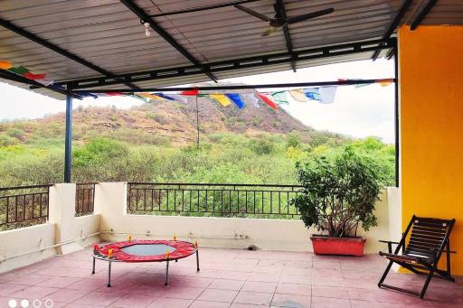 Blissful Penthouse overlooking Ghoradeshwar Forest - Housity