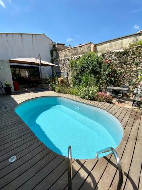 Villa conviviale à Cournonsec avec piscine privée - Housity