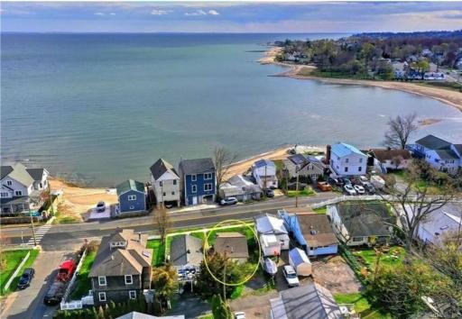 Beachy Bay Breeze Bungalow 2BR with parking and close to many amenities. - Housity