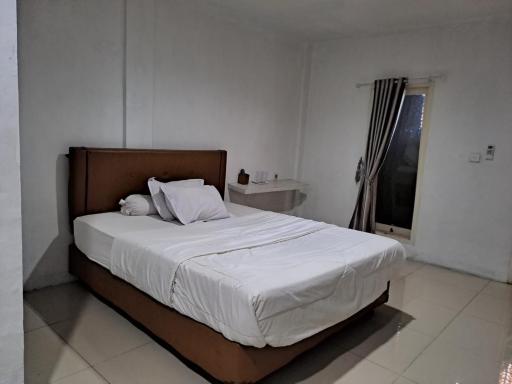 UNIK Guest House Syariah - Housity