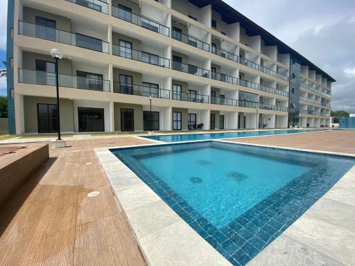 Flat em condomínio pé na areia em Maria Farinha - Housity