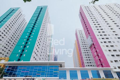RedLiving Apartemen Green Pramuka - Family Group Tower Orchid - Housity
