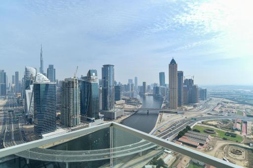 Luxury Escapes - View of Canal & Burj Khalifa 1BR Large Premium Apt - Amna Tower - Housity