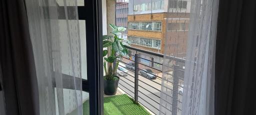 Chic Maboneng Balcony Apartment With Stunning City Views - Housity