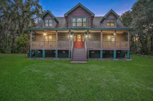 Cozy 4BR Cabin on 11 acres with pool, BBQ & patio! - Housity