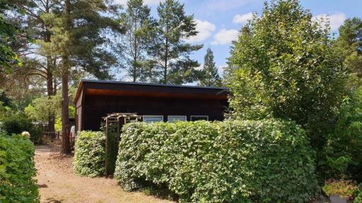 Holz-Bungalow mit Terrasse - Housity