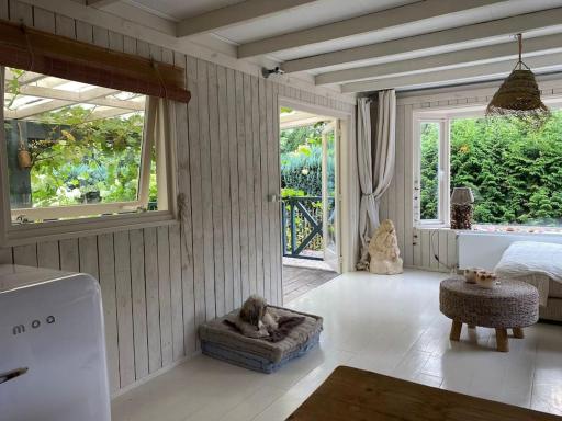 Romantisch boshuisje met jacuzzi - Housity