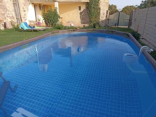 Sardegna casa con giardino ,piscina a 3km dal mare - Housity