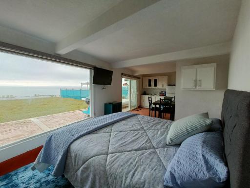 Estudio privado con jardín, fogata y vista al mar - Housity