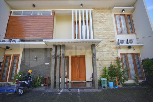 One & Quin Guest House Syariah Mitra RedDoorz - Housity