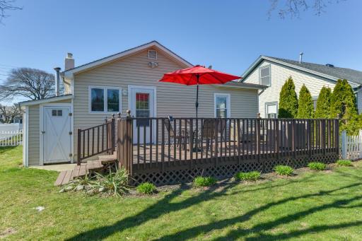 Cozy Villas Cottage with Deck, half Block to Beach! - Housity