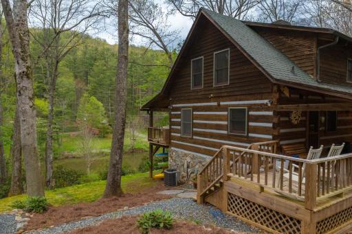 Log Cabin on the River w/Hot Tub - Housity