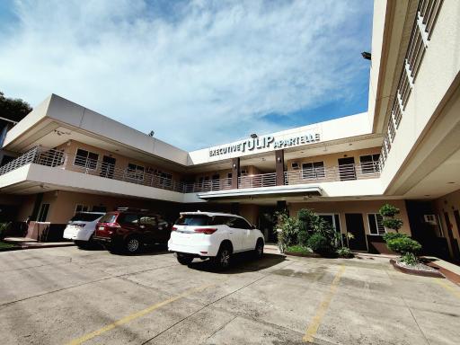 Executive Tulip Apartelle - Housity