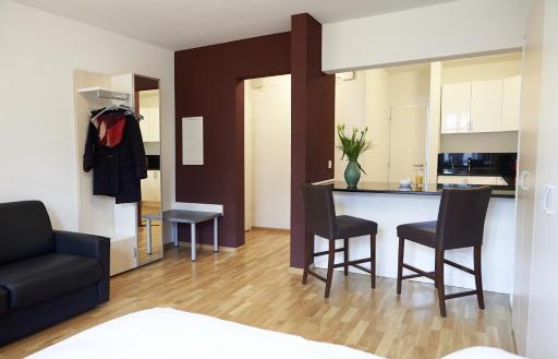 Residence Apartments by Hotel du Commerce - Housity