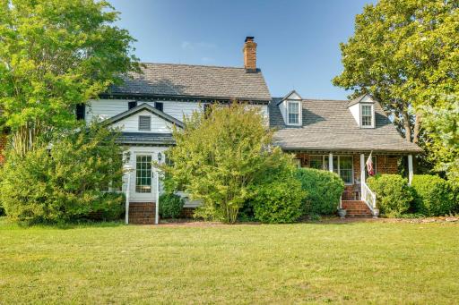 Terre Haute Manor Farmhouse with Gardens and Deck! - Housity