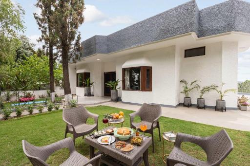StayVista's L Amore - Hillside Retreat with Mountain & Valley View, Lawn & Indoor-Outdoor Games - Housity