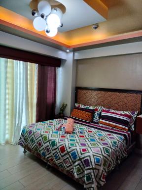 AFFORDABLE CONDOTEL NEAR AIRPORT at 2 PALM TREE VILLAS - Housity