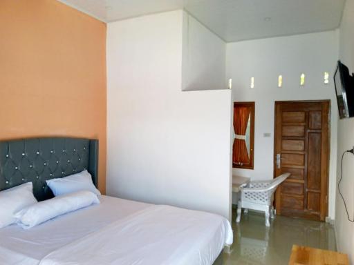 RedDoorz @ Sihole Paradise Inn Parbaba - Housity