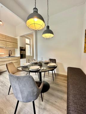 Erholsame City-Erdgeschosswohnung mit Veranda, Grill und Parkplatz D46EG - Housity