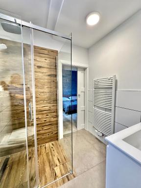 Erholsame City-Erdgeschosswohnung mit Veranda, Grill und Parkplatz D46EG - Housity