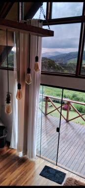 Chalé com vidros e hidromassagem - Housity