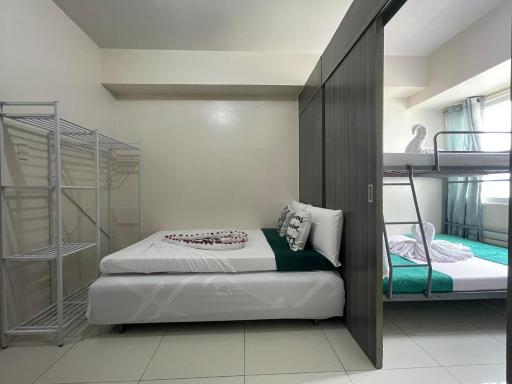 Green Residences Stays by PBYY with Complimentary Breakfast for 2 - Housity