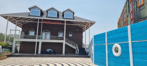 Wood Castle by Alishan Central - Housity